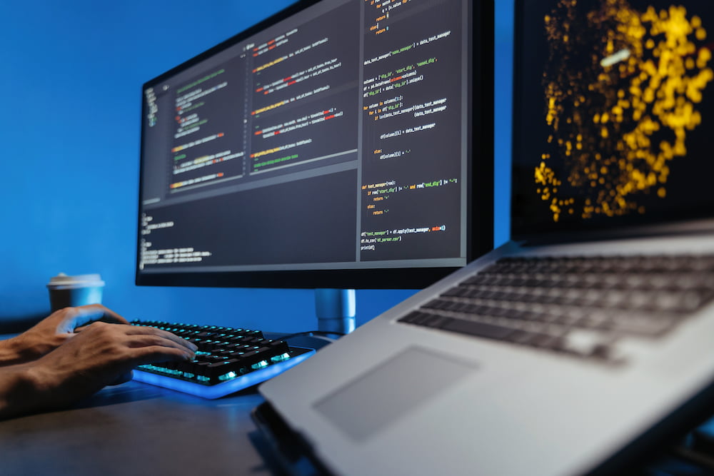 coding-on-computer-with-glowing-keyboard-at-night-2026-03-16-04-37-23-utc