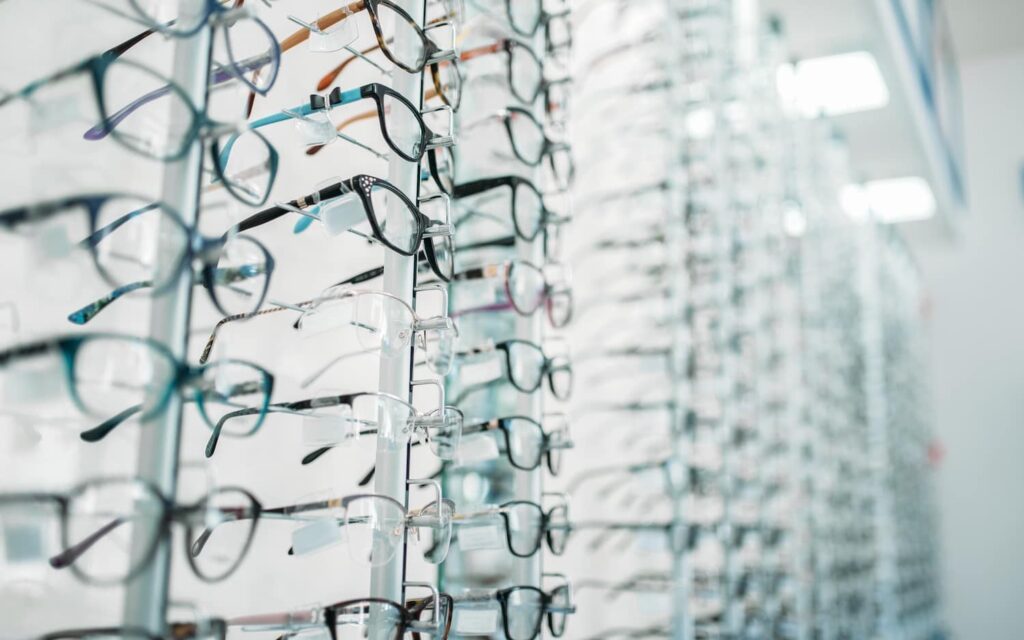 Sunglasses displayed on a stand