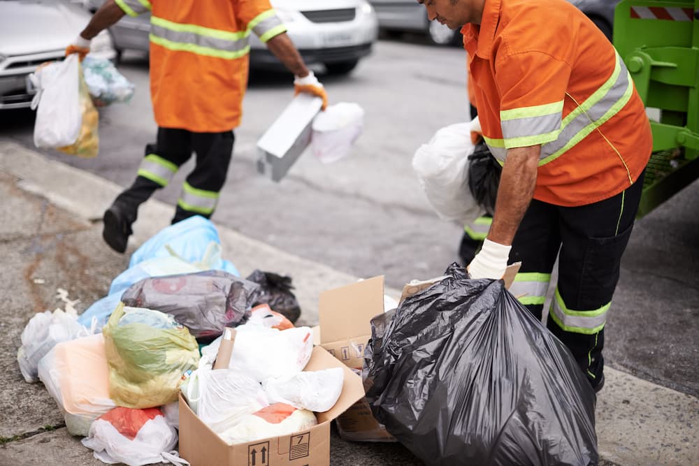 garbage-collectors-at-work-on-a-city-street-2026-03-25-08-28-04-utc