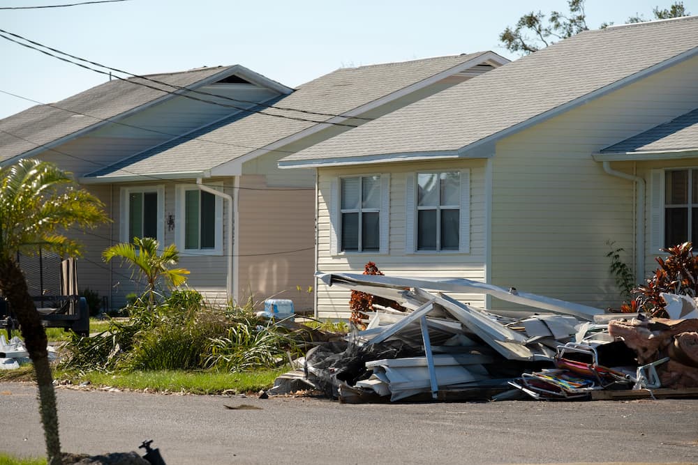 heaps-of-debris-rubbish-on-street-side-near-severe-2026-01-06-10-11-04-utc